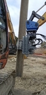 Side grip pile driver for low height working areas